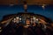 Businessjet Cockpit at night during cruise flight.