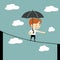 Businessman across another building buy line holding umbrella