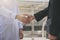 Businessman arabic making handshake agreement. concept partner