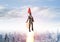 Businessman in aviator hat flying on rocket