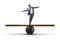 The businessman balancing on seesaw in uncertainty concept