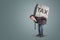 Businessman bending under a heavy stone with the word TAX on it