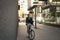 Businessman on a bike. Business man driving bike on street.