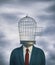 Businessman with a bird cage head