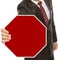 Businessman With Blank Stop Sign