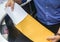 Businessman in blue shirt pull the mock up business documents from envelope