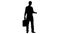 Businessman with a briefcase in his hands is thinking about business. Silhouette White background