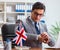 Businessman with British flag in the office