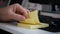 Businessman Browsing Small and Yellow Sticky Notes on Office Desk