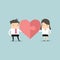 Businessman and businesswoman with heart puzzle. Office love concept