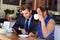 Businessman And Businesswoman Meeting In Coffee Shop