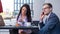 Businessman and businesswomen having a meeting in cafe.