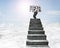 Businessman carrying fear concrete word on top of concrete stair