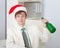 Businessman celebrates Christmas at office