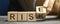 Businessman changes wooden blocks with the words Risk and Rise. Business risk management and growth performance. Risks assessment