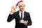 Businessman with a Christmas hat holding a cup of espresso coffee and gesturing perfect