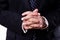 Businessman clasping hands