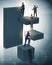Businessman climbing blocks in career ladder business concept