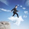 Businessman climbing on cloud stairway concept