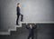 Businessman climbs the concrete stairs, which the other person keeps.