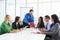 Businessman Conducting Meeting In Boardroom