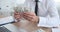 Businessman counting his salary sitting at office