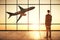 Businessman in creative airport interior