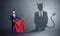 Businessman with devil shadow and toreador concept