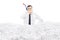Businessman diving into a pile of shredded paper