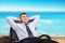 Businessman dreaming about vacation