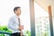 Businessman drinking a coffee and looking view and thinking success