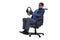 Businessman driving an office chair