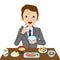 Businessman eating Japanese breakfast