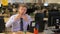 Businessman eating pizza at his desk