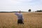 Businessman explore in the wheat field