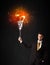 Businessman with an explosion bulb