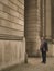 Businessman facing monumental building