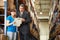 Businessman And Female Worker In Distribution Warehouse