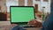 Businessman fingers scrolling mockup laptop touchpad working at home closeup