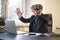 businessman finishes his work and taking virtual reality goggles on