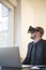 businessman finishes his work and taking virtual reality goggles on