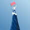 Businessman first reached the summit of the mountain with a flag. Business people reached his goal. Business concept win