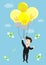 Businessman float in the air by idea light bulb balloon