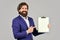 Businessman with folder. Confident businessman holding folder for documents. Control and inspection. Bearded man making