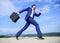 Businessman formal suit carries briefcase sky background. Businessman hurrying to business meeting. I will be there in