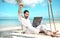 Businessman freelance on beach with laptop