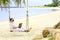 Businessman freelance on beach with laptop