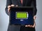 Businessman with full battery on a tablet