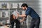 Businessman giving high five to hispanic disabled businesswoman