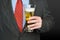 Businessman with glass of beer
